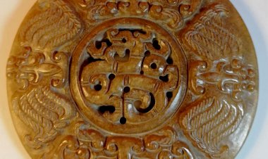 E32  戰國 神鳥獸面紋玉璧