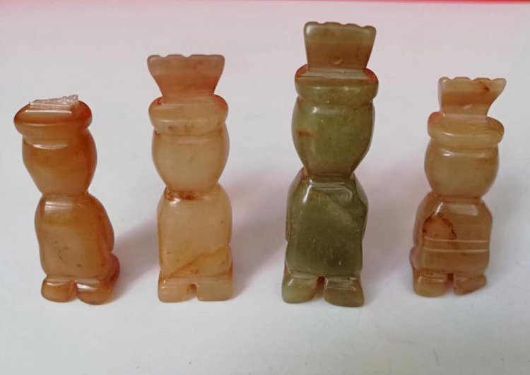 E010 Four Squatting Jade People Ornaments