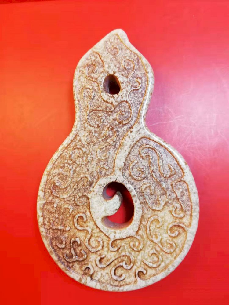 E63 戰國 異形璧似的玉珮飾